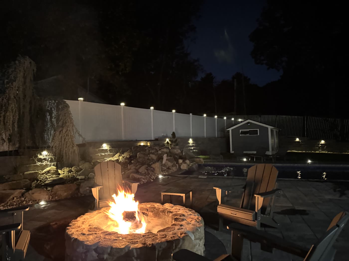 The stone fire pit out back