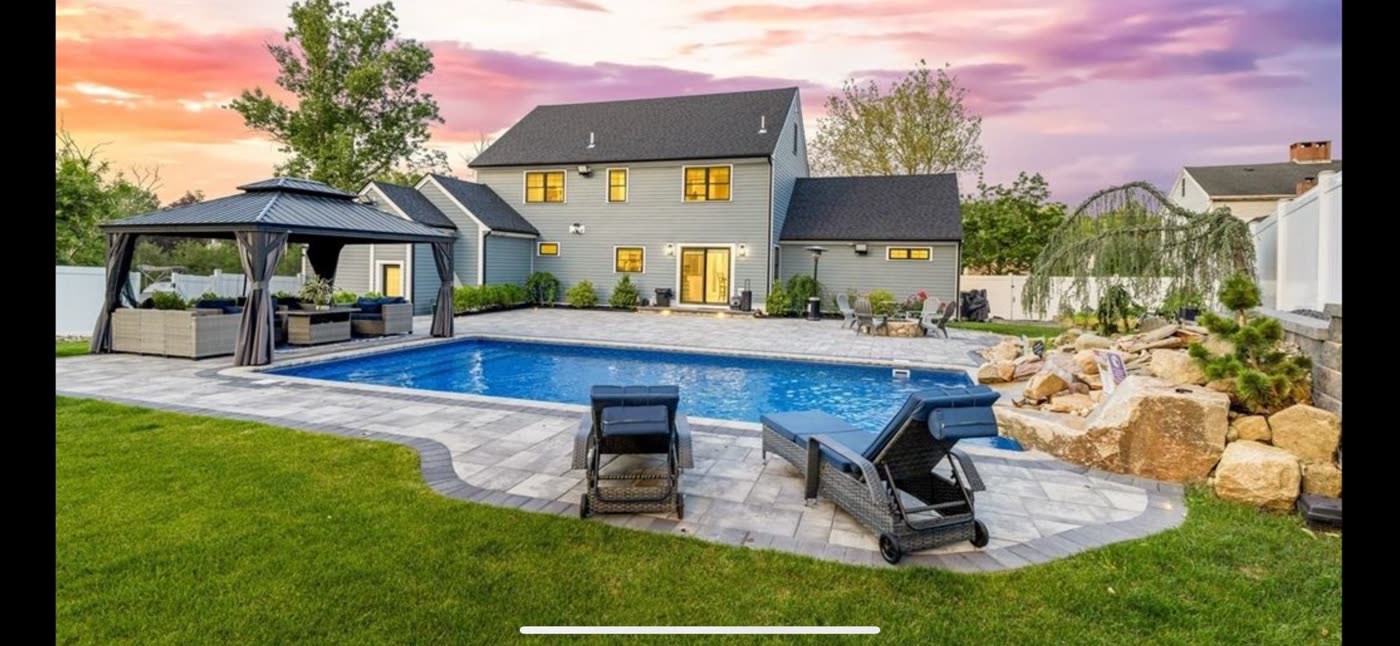The in-ground pool in the back yard